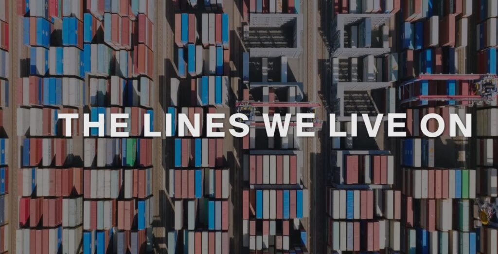 The Lines We Live On overlayed rows of shipping containers.